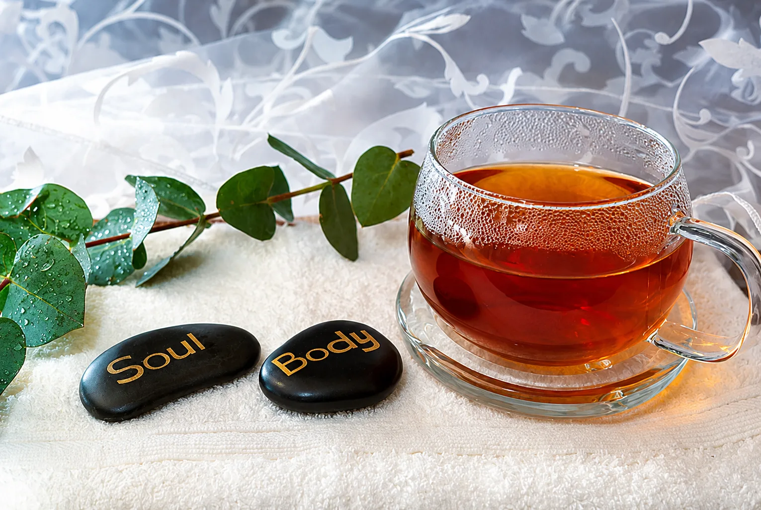 Warm herbal tea in a calming spa and wellness setting